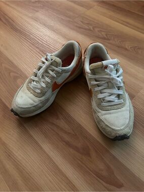 Nike women’s Cream and Orange Retro Running Sneakers